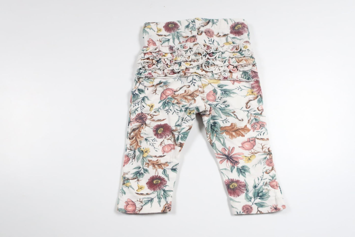 Blommiga byxor med volang från Lindex - Storlek 62 - Multi