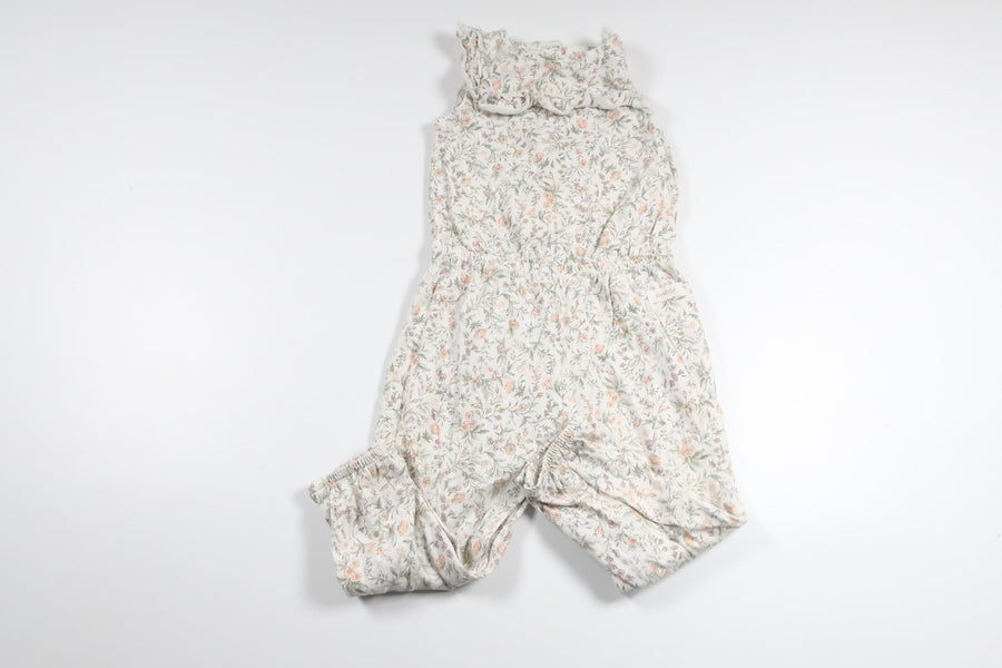 Blommig jumpsuit från Newbie - Storlek 86 - Vit