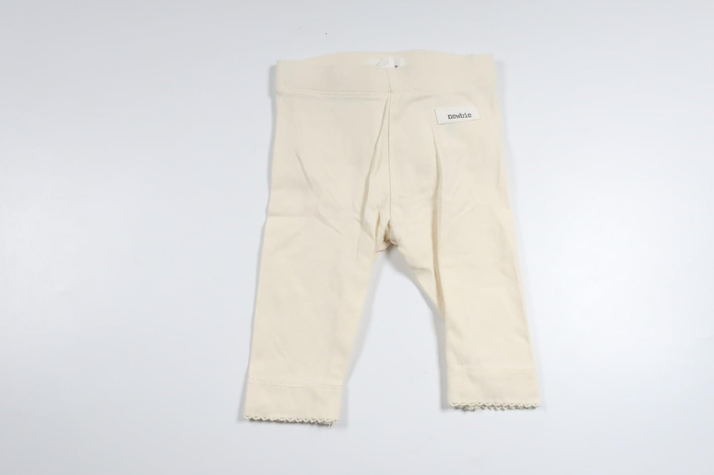 Byxor med volang från Newbie - Storlek 56 - Gul