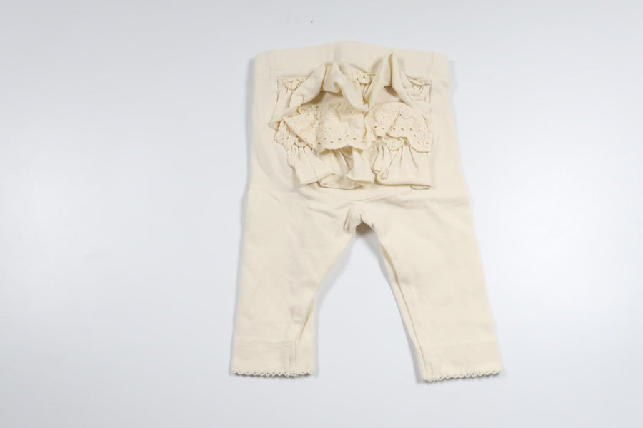 Byxor med volang från Newbie - Storlek 56 - Gul