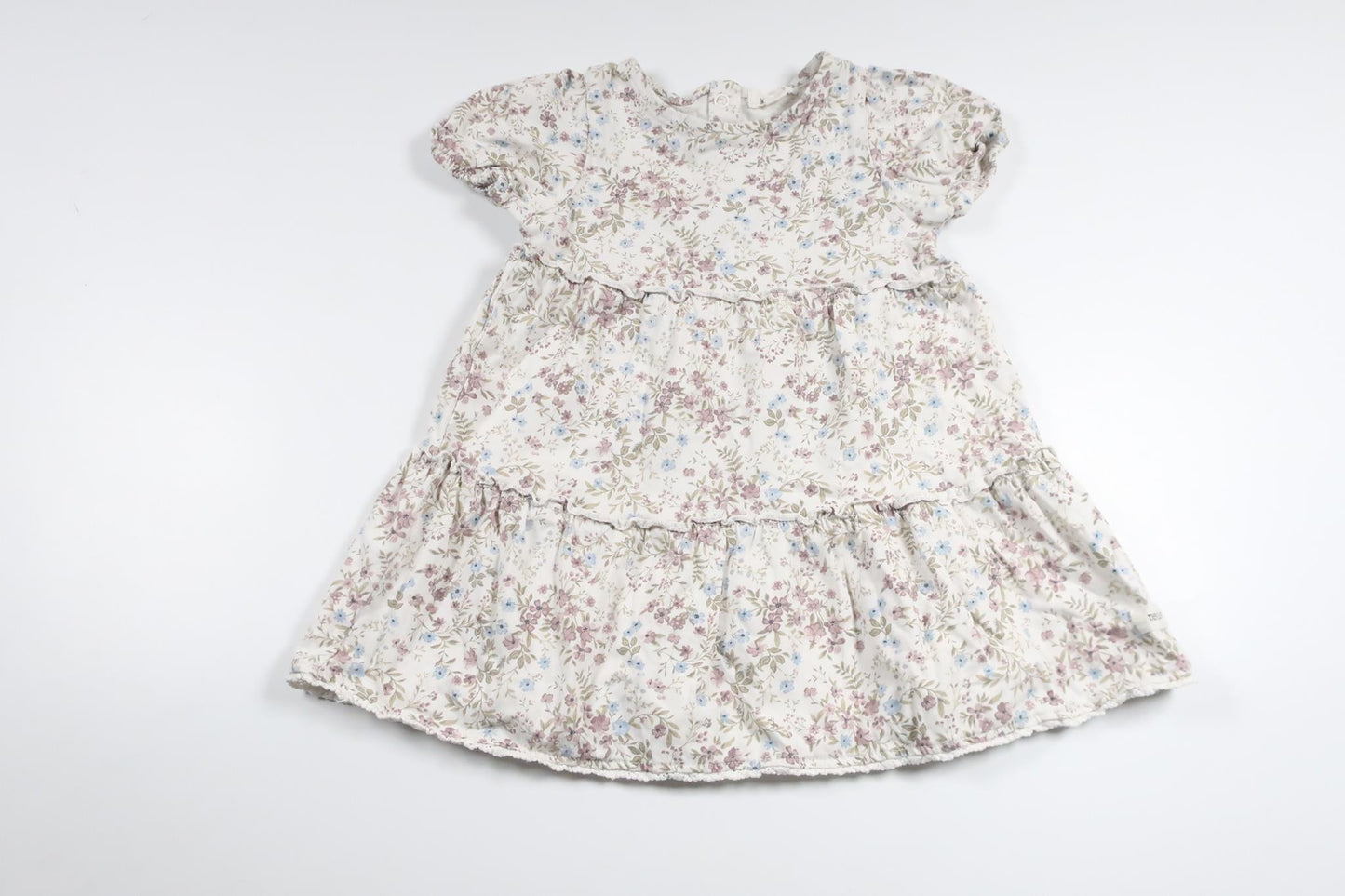 Blommig klänning från Newbie - Storlek 86 - Vit