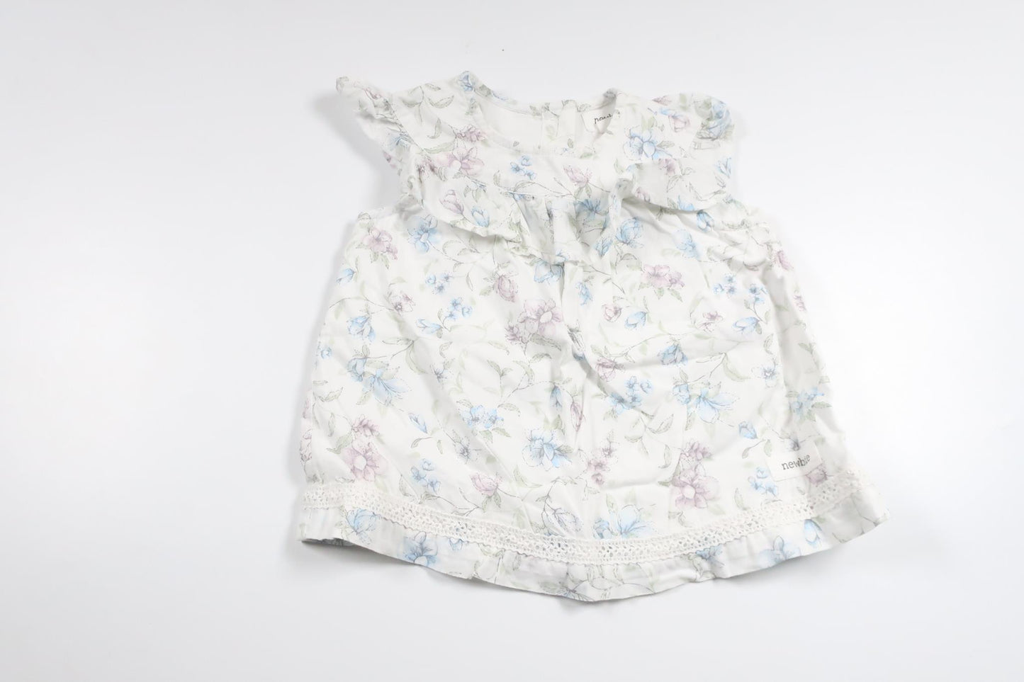 Blommig klänning från Newbie - Storlek 56 - Vit