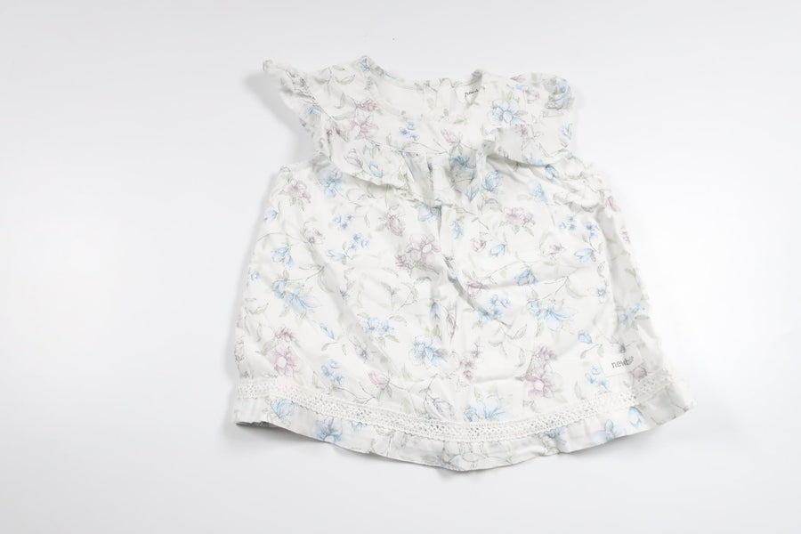 Blommig klänning från Newbie - Storlek 56 - Vit