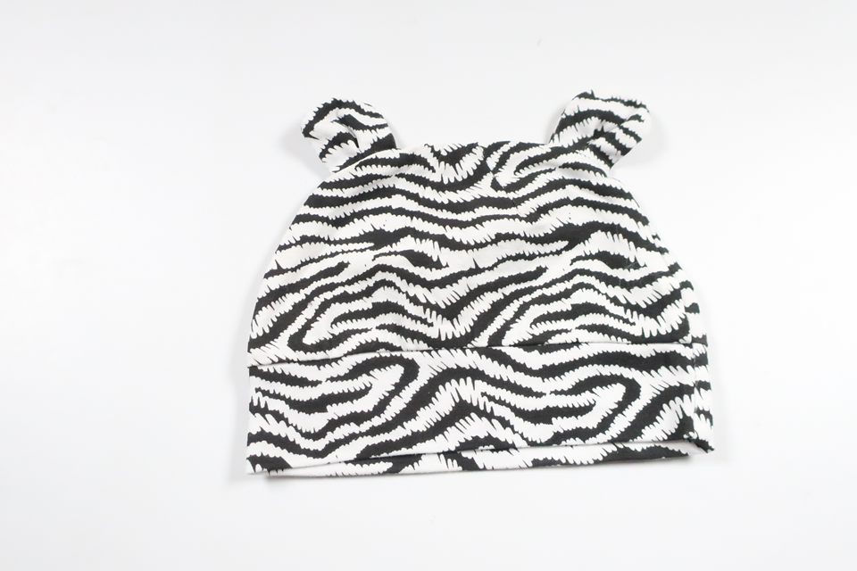 Mössa från Okänt - Storlek 62 - Vit