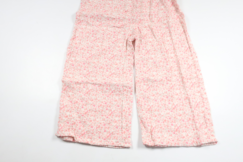 Blommig jumpsuit från Lindex - Storlek 122 - Rosa