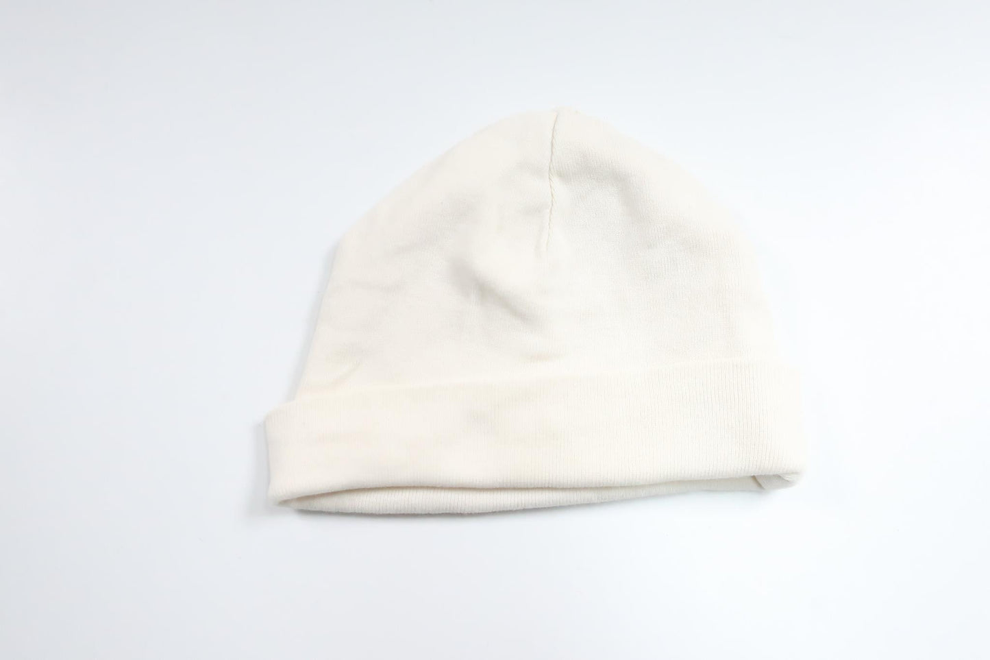 Mössa från H&M - Storlek 50 - Benvit