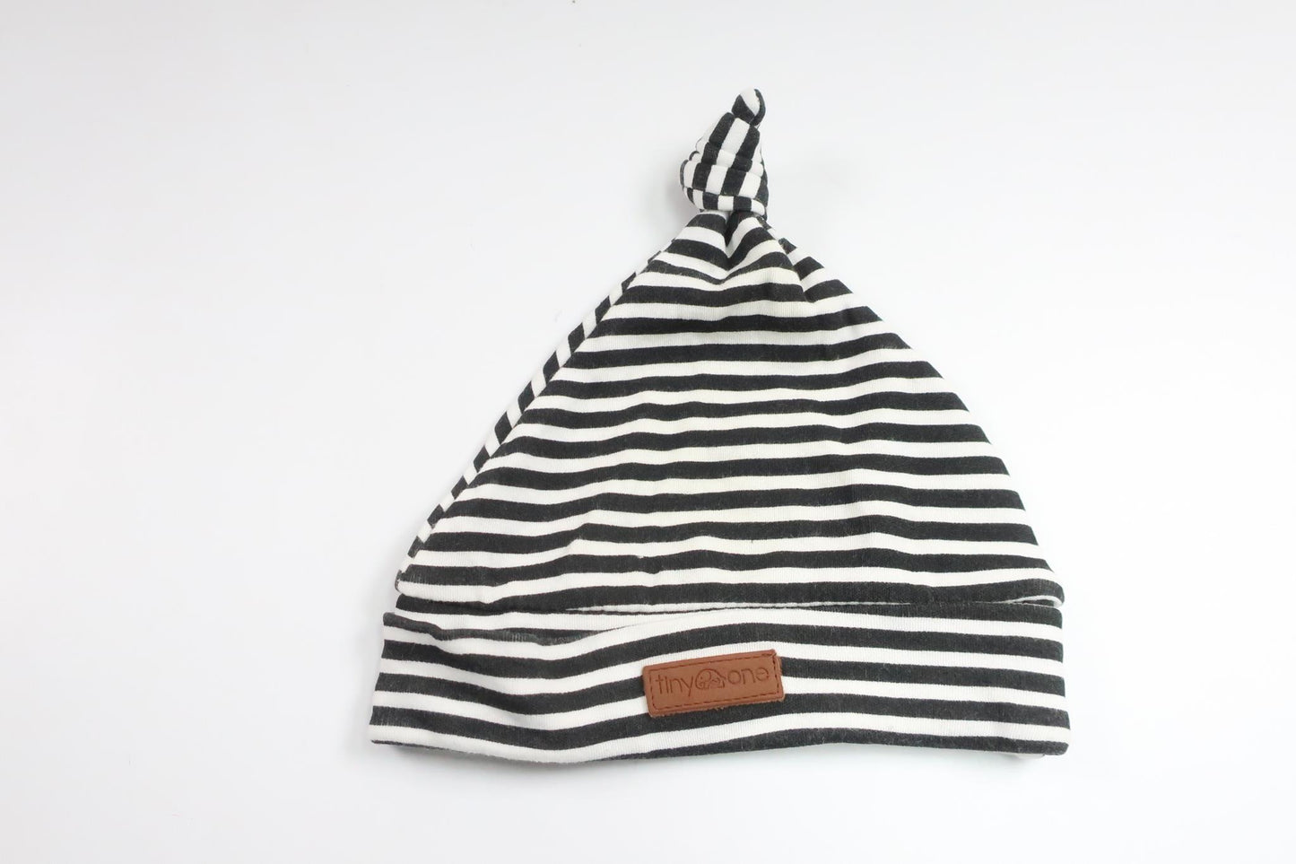 Randig mössa från Tiny One - Storlek 62/68 - Svart