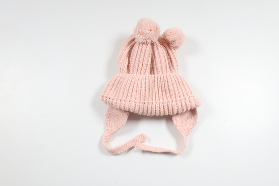 Mössa med tofs från Okänt - Storlek 56/62 - Rosa