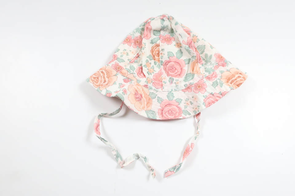 Blommig solhatt från H&M - Storlek 62/68 - Benvit