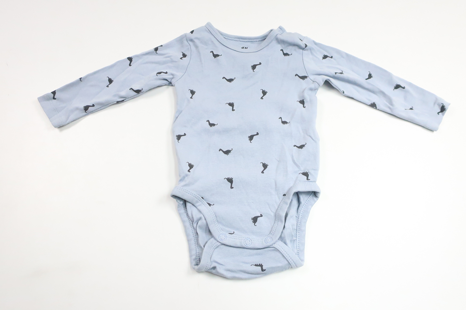 Body med dinosaurier från H&M - Storlek 62/68 - Blå