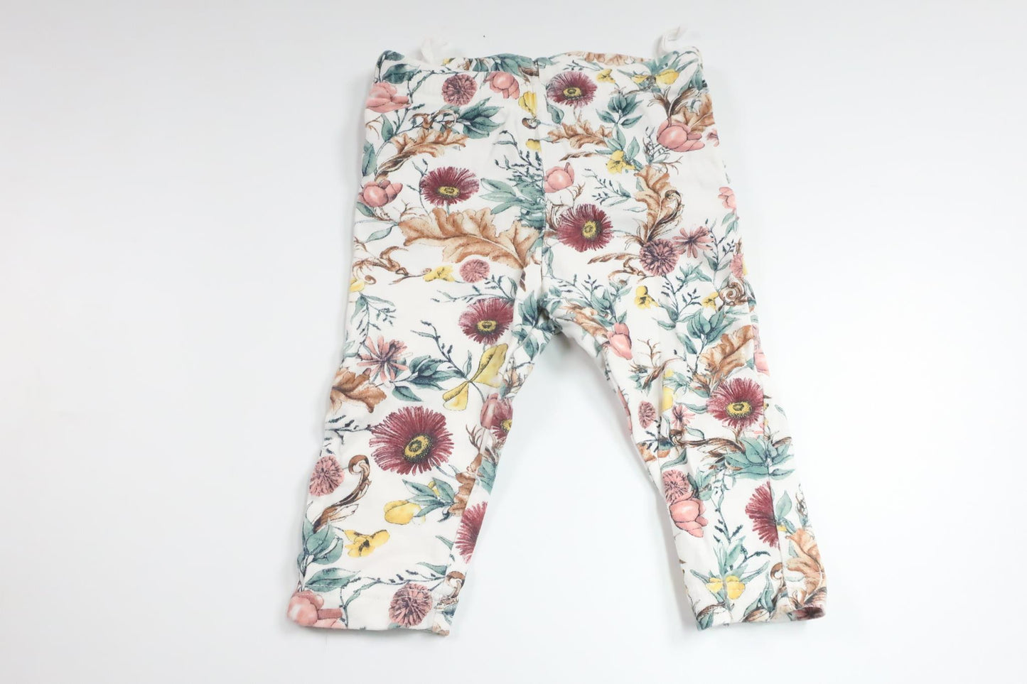 Blommiga byxor med volang från Lindex - Storlek 62 - Vit