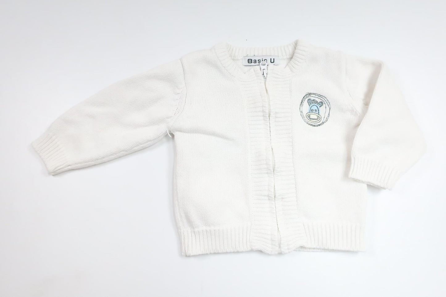 Stickad kofta från Basic U - Storlek 62 - Vit
