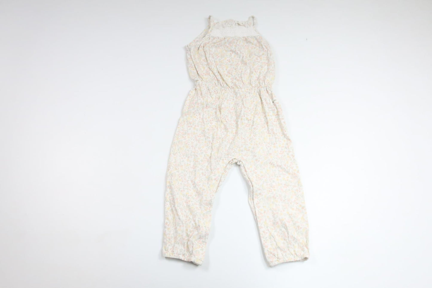 Blommig jumpsuit från Newbie - Storlek 86 - Gul