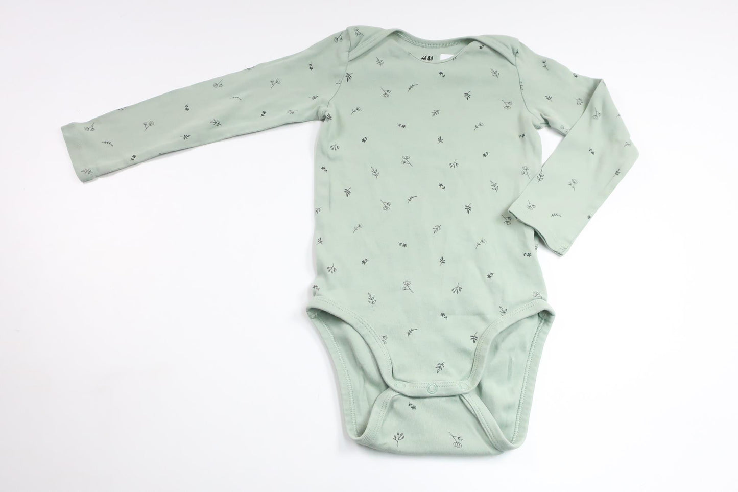 Blommig body från H&M - Storlek 92 - Grön