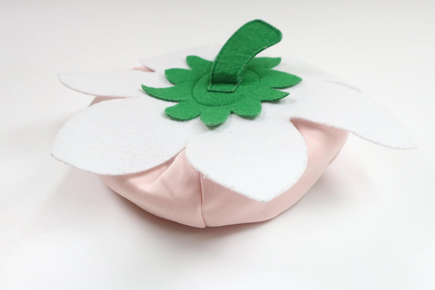 Blommig mössa från H&M - Storlek 62/68 - Rosa