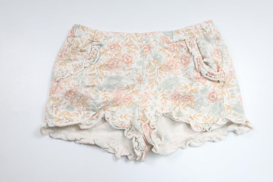Blommiga shorts från Newbie - Storlek 110/116 - Gul