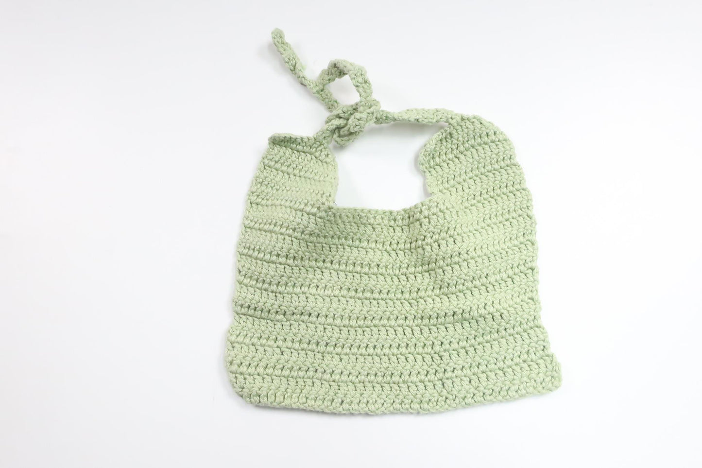 Stickad haklapp från Hemstickat - Storlek One size - Grön