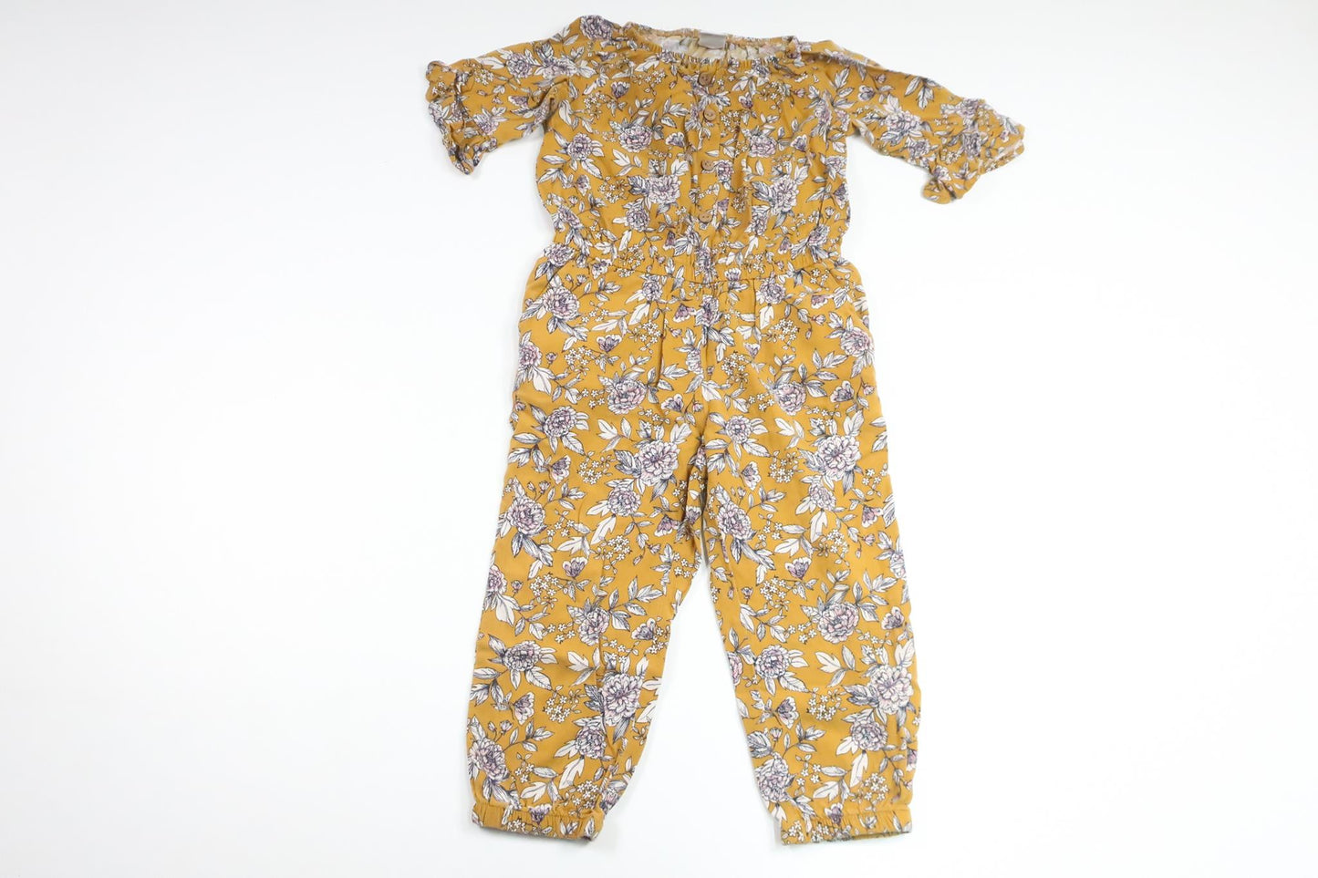 Blommig jumpsuit från Lindex - Storlek 98 - Gul
