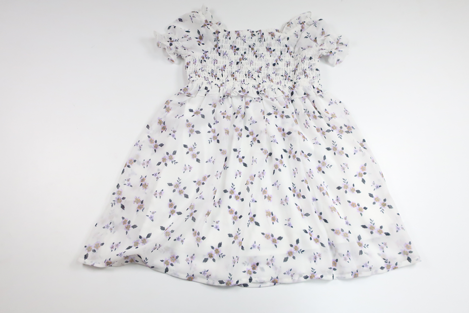 Blommig klänning från Cubus - Storlek 104 - Vit