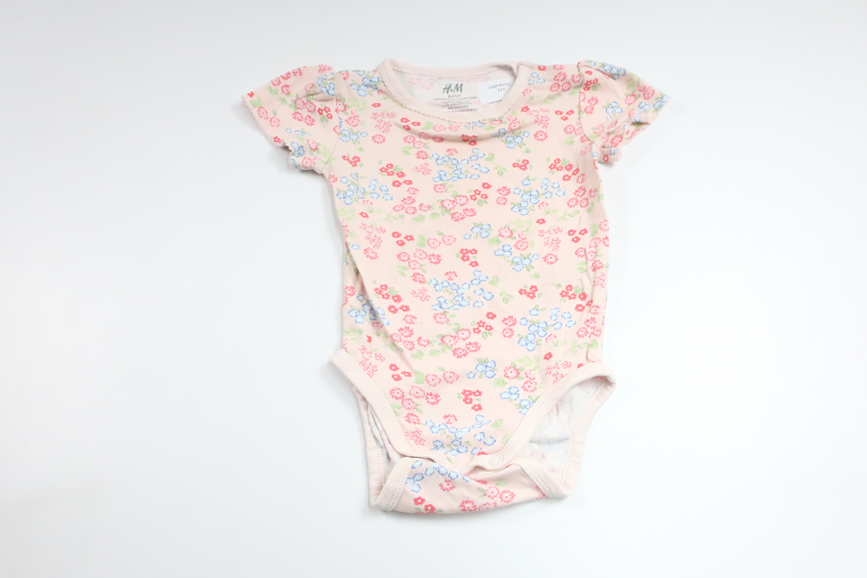 Blommig body från H&M - Storlek 74 - Rosa