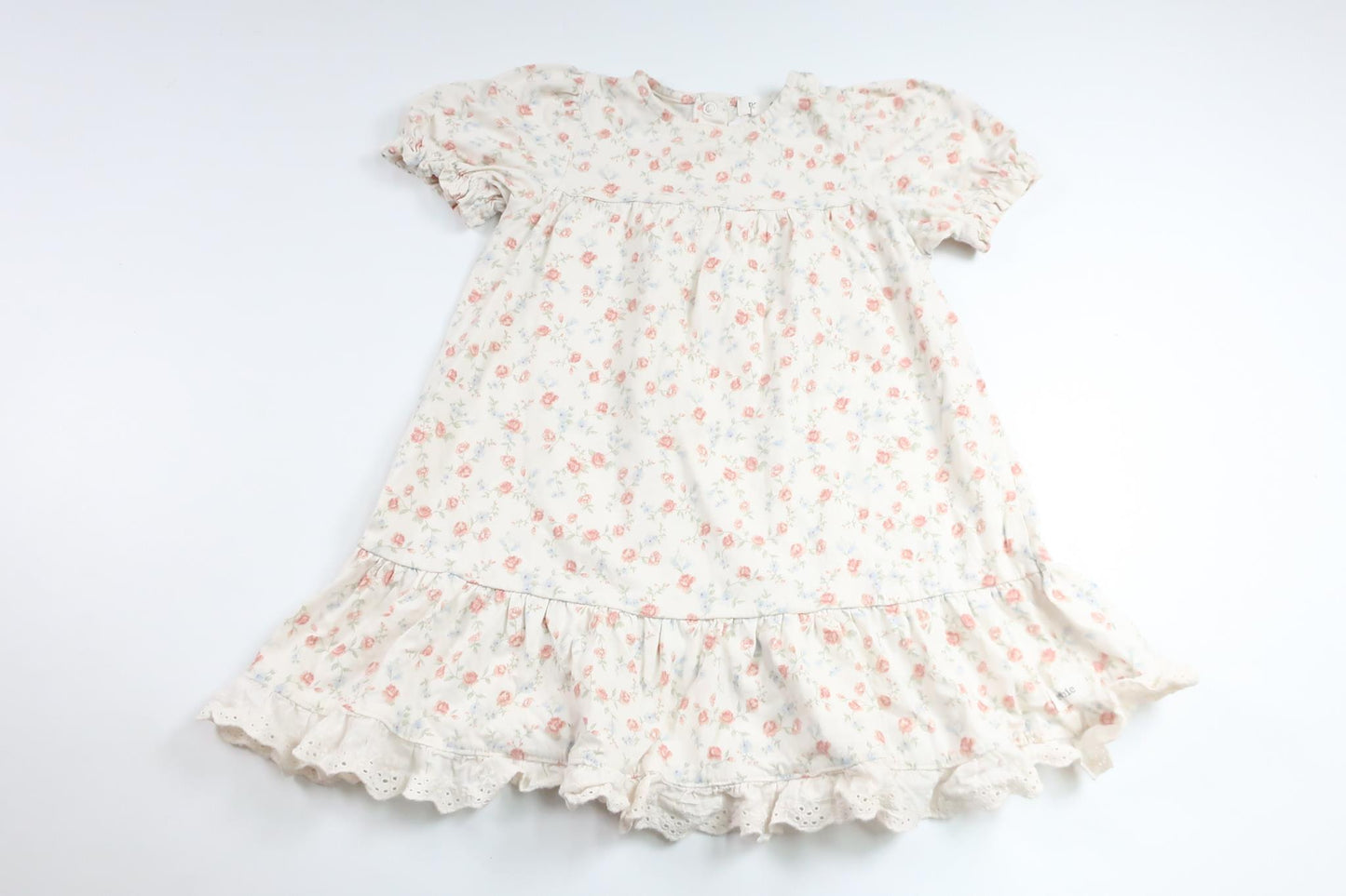 Blommig klänning från Newbie - Storlek 98 - Vit