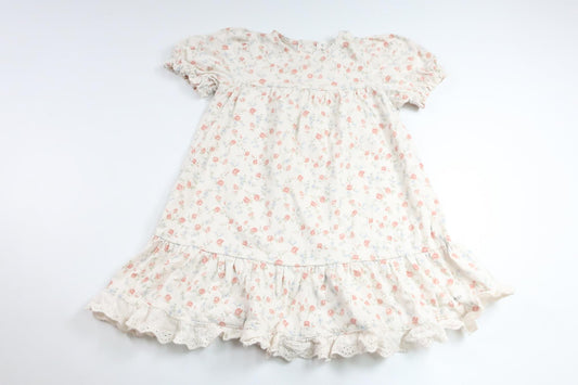 Blommig klänning från Newbie - Storlek 98 - Vit