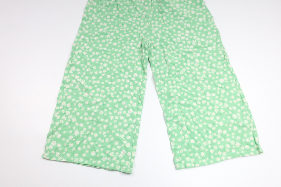 Blommig jumpsuit från Lindex - Storlek 128 - Grön