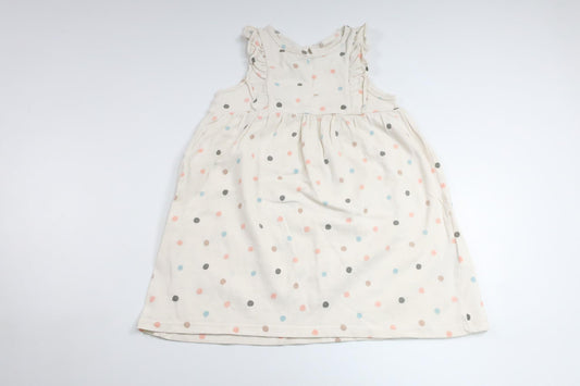 Prickig klänning från H&M - Storlek 86 - Benvit