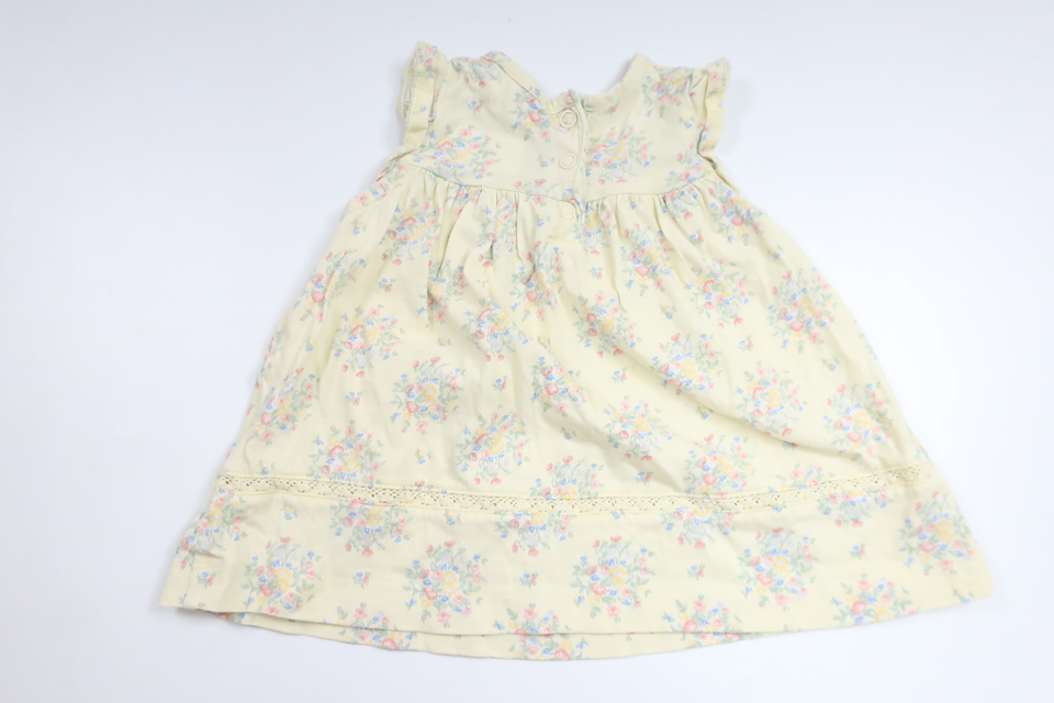 Blommig klänning från Newbie - Storlek 56 - Gul