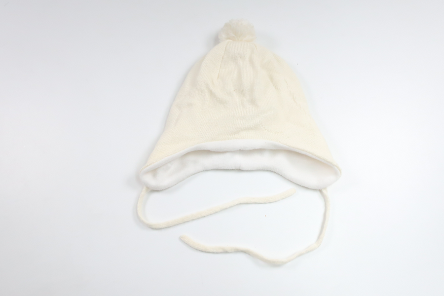 Fleecefodrad mössa i ullmix från Reima - Storlek 52 - Benvit