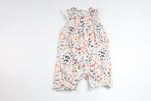 Blommig jumpsuit från Tiny One - Storlek 68 - Vit