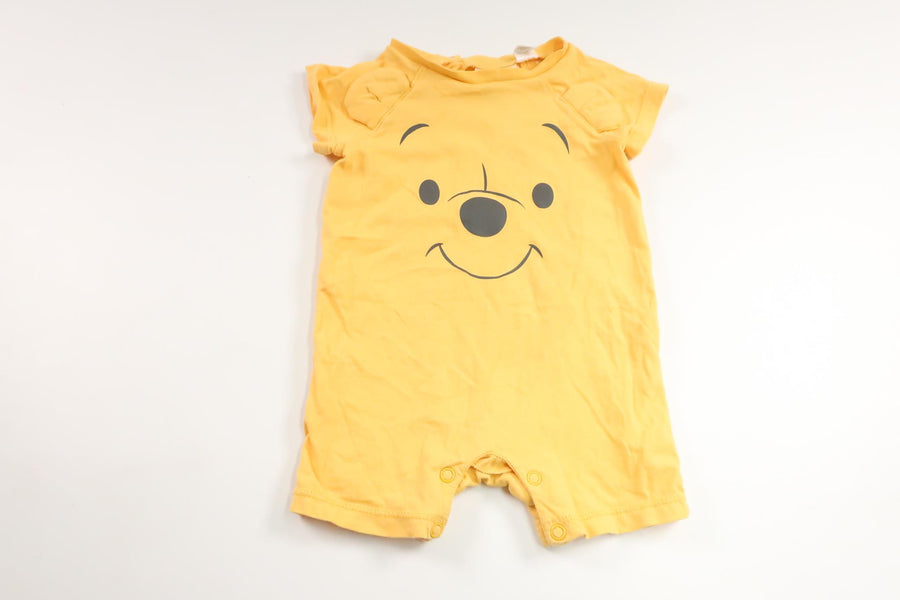 Jumpsuit med Nalle Puh från H&M - Storlek 62 - Gul