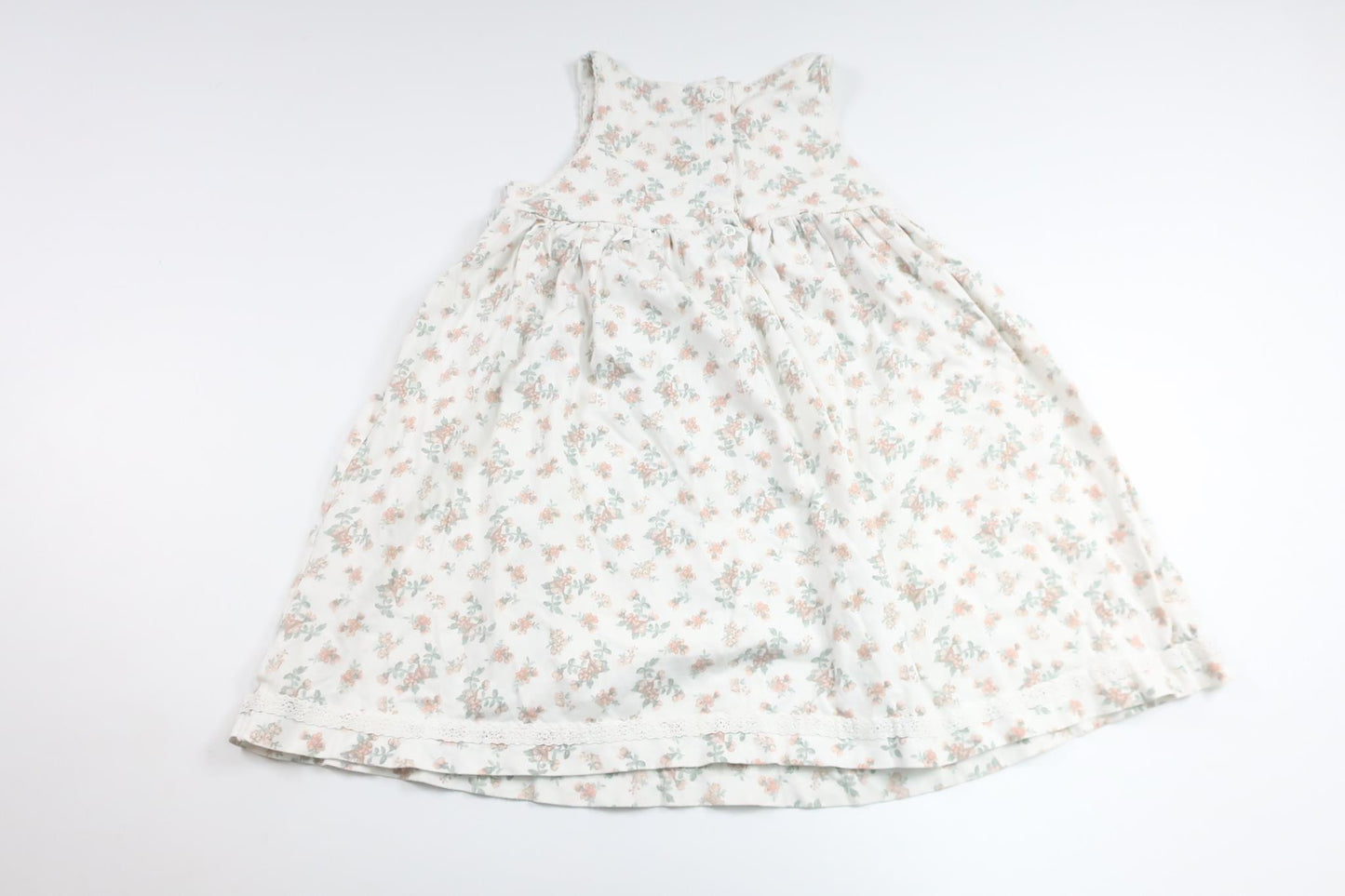 Blommig klänning från Newbie - Storlek 104 - Vit