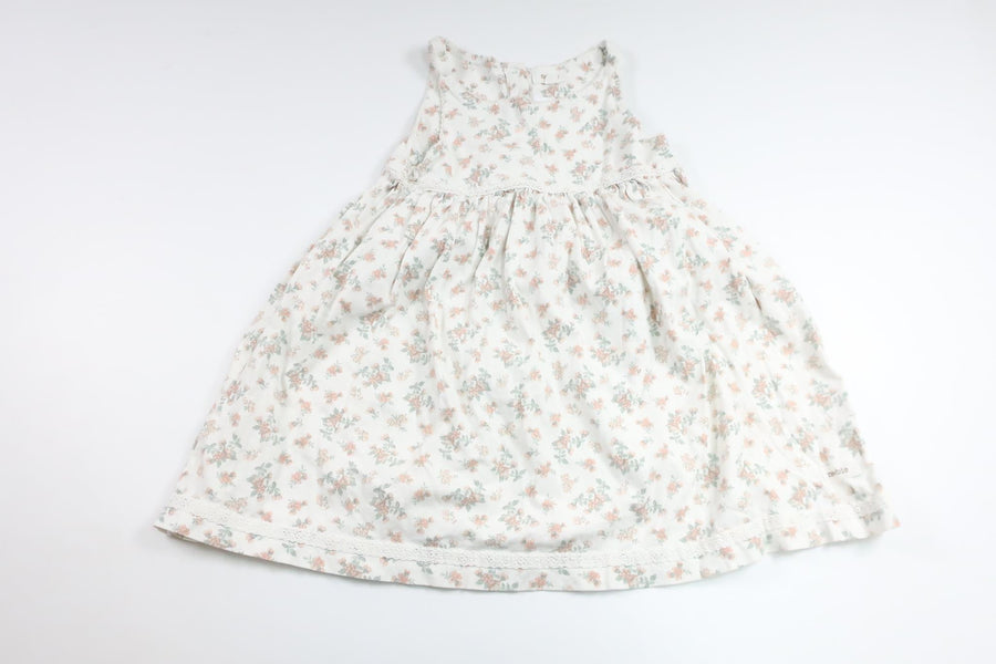 Blommig klänning från Newbie - Storlek 104 - Vit