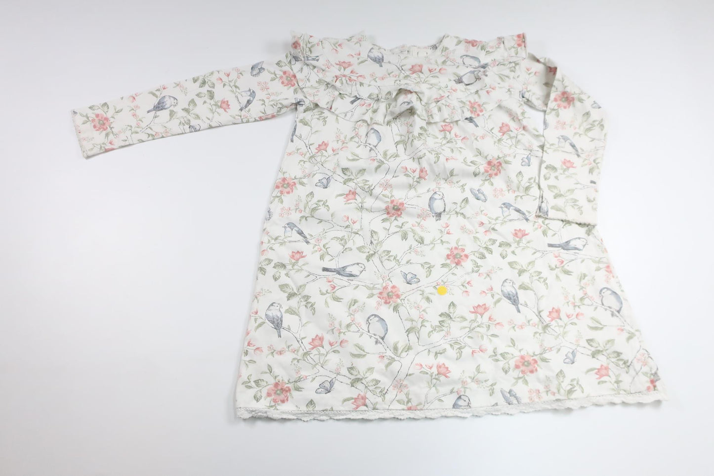 Blommig klänning från Newbie - Storlek 116 - Vit