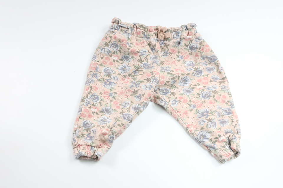 Blommiga byxor från Newbie - Storlek 68 - Rosa