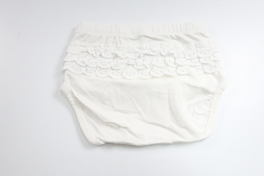 Blöjtrosa med volang från Newbie - Storlek 74/80 - Vit