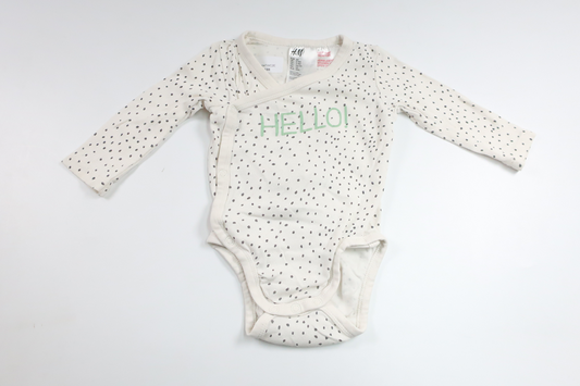 Prickig omlottbody från H&M - Storlek 62 - Benvit