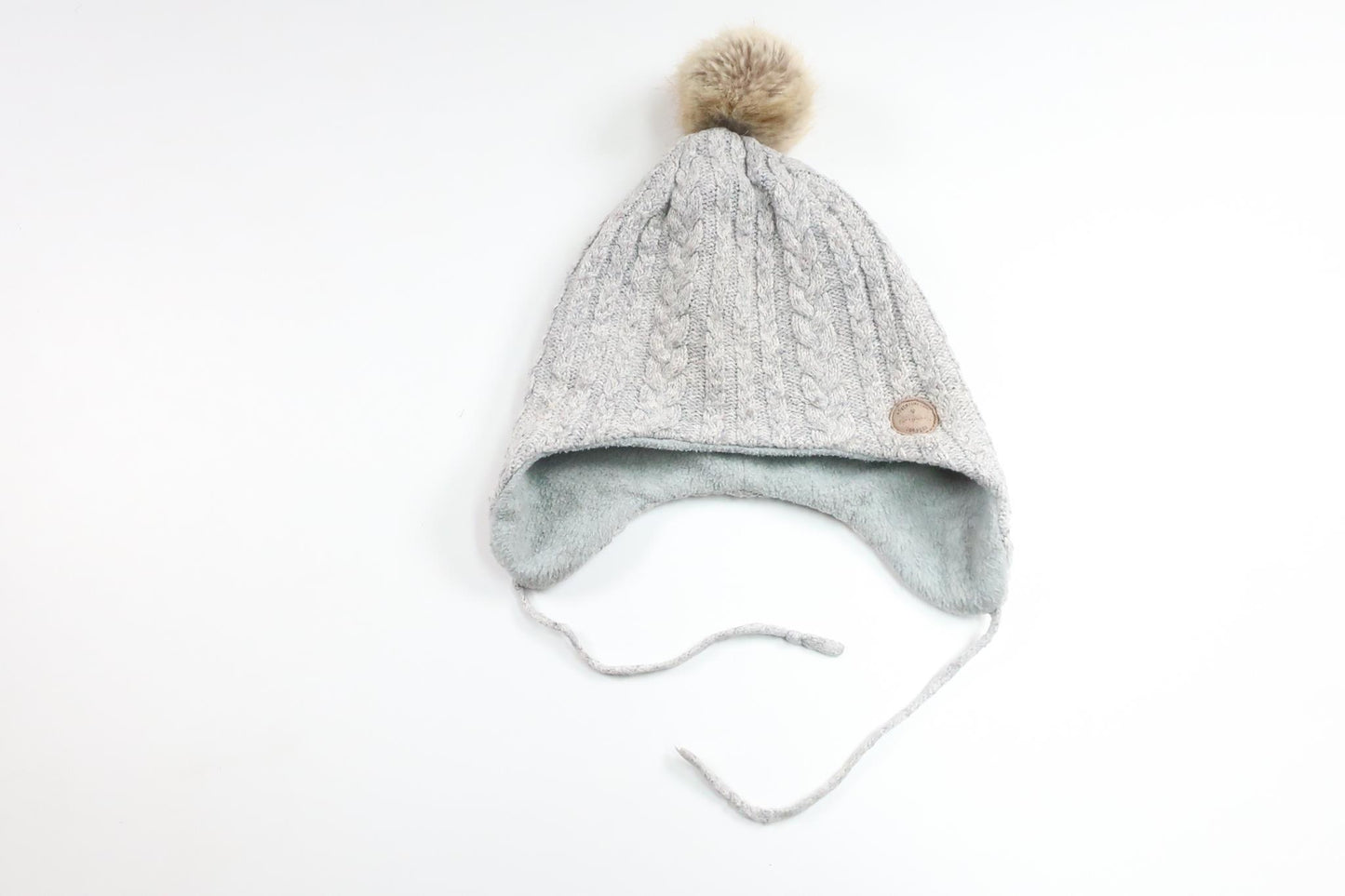 Fleecefodrad mössa med tofs från H&M - Storlek 110/128 - Grå