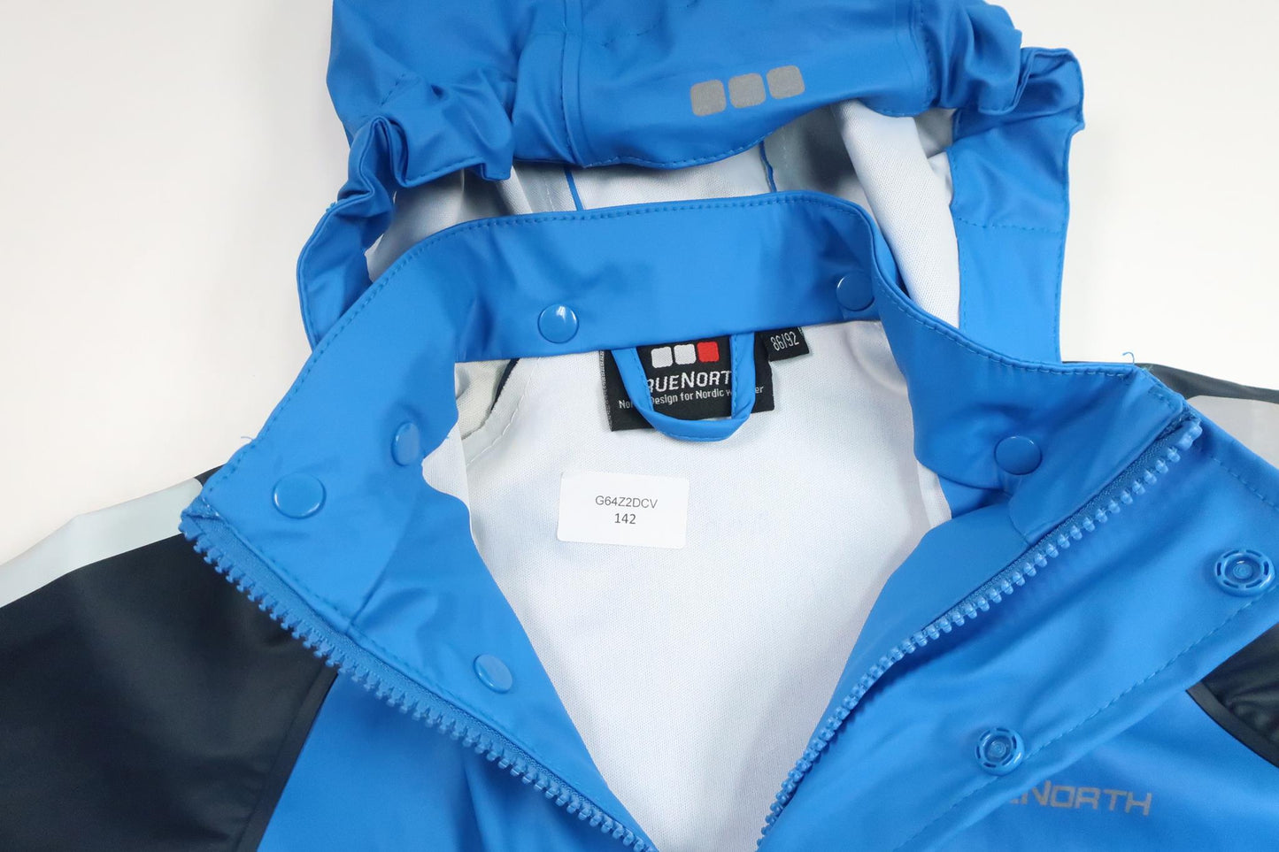 Regnjacka från True North - Storlek 86/92 - Blå