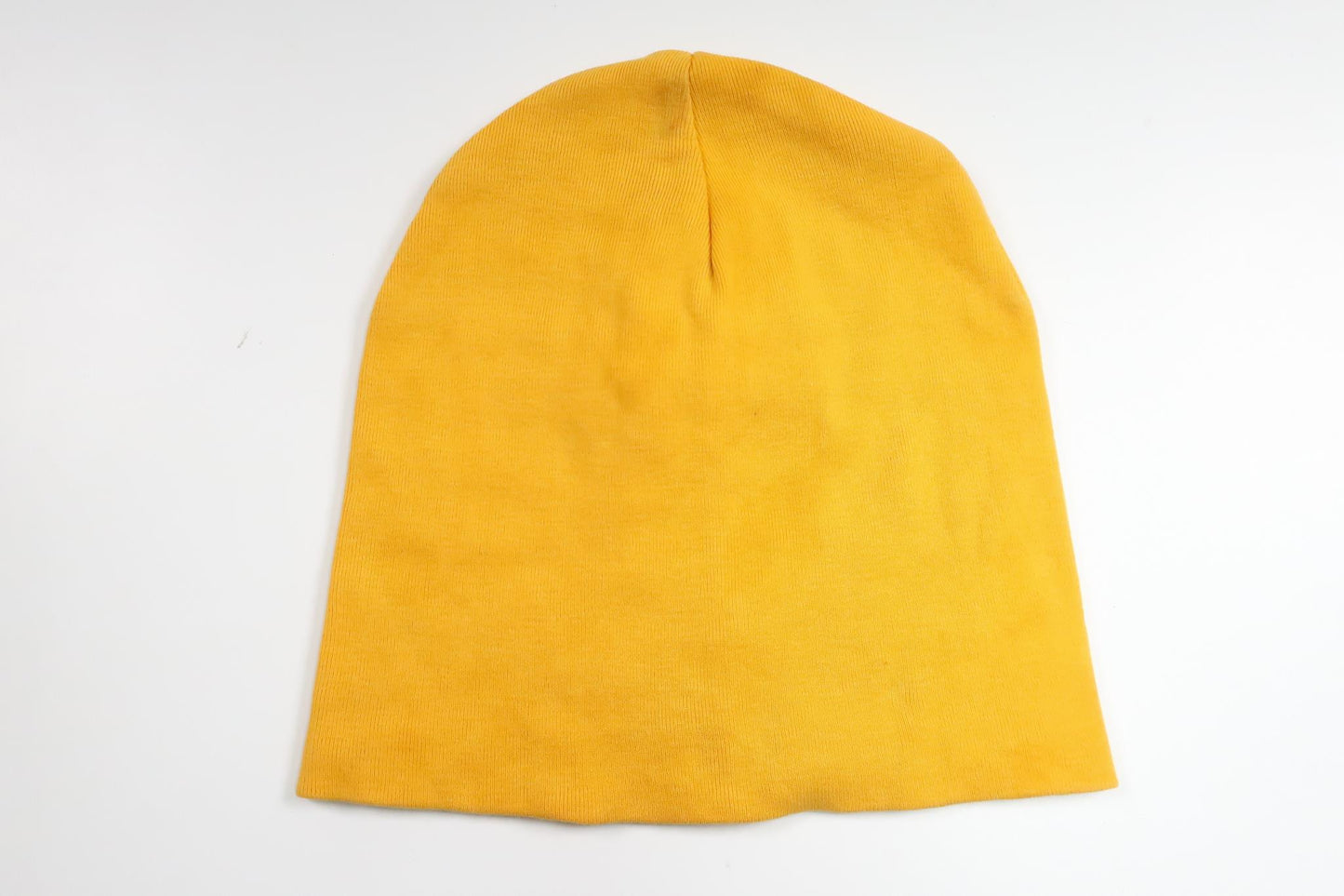 Mössa från Åhléns - Storlek 74/80 - Gul