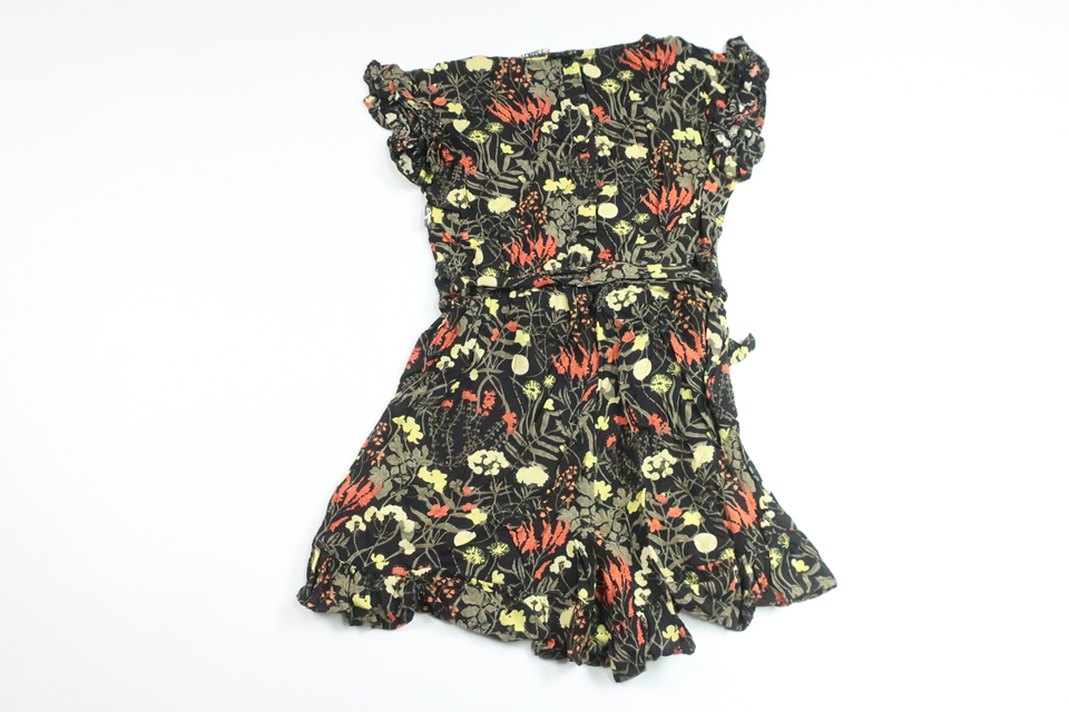 Blommig jumpsuit från SRNHLT - Storlek 92 - Svart