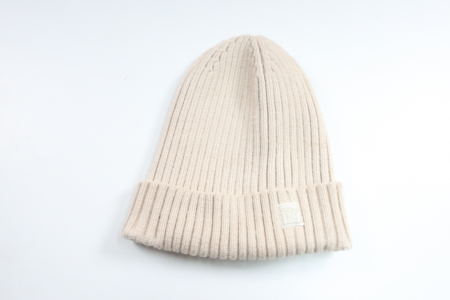 Ribbstickad mössa från SRNHLT - Storlek 52/54 - Beige