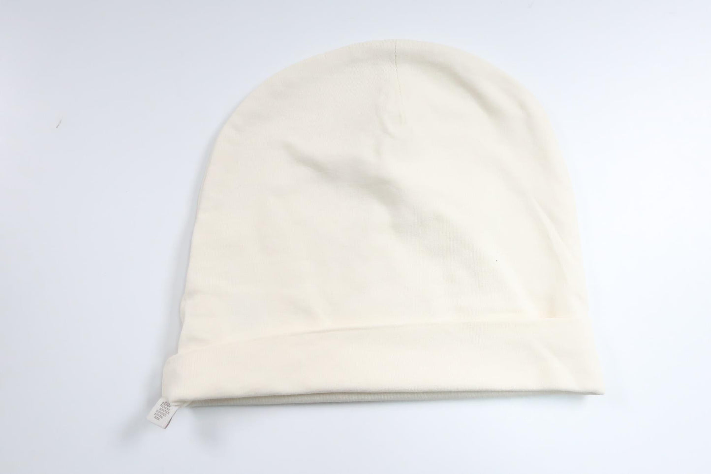 Mössa från BEBE - Storlek 68/74 - Benvit