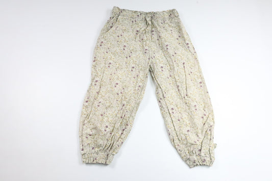 Blommiga byxor från PompdeLux - Storlek 104 - Benvit