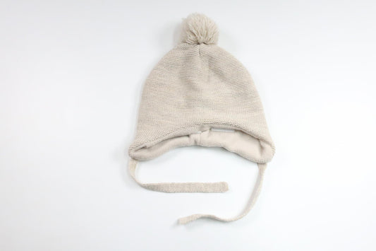Fleecefodrad mössa med tofs från H&M - Storlek 74/80 - Beige