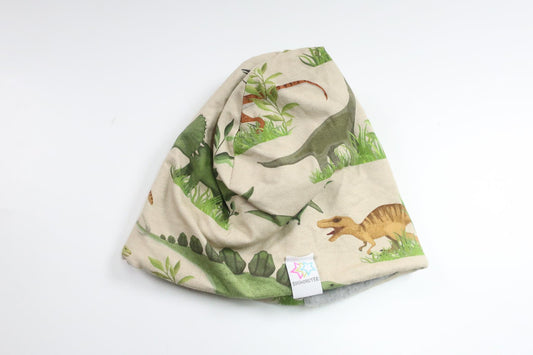 Fleecefodrad mössa med dinosaurier från Busmonster - Storlek 74/80 - Beige