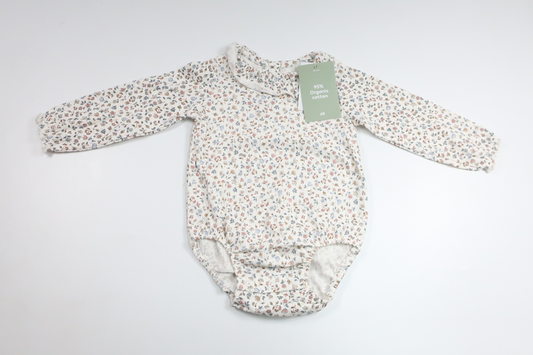Blommig body från H&M - Storlek 74 - Vit