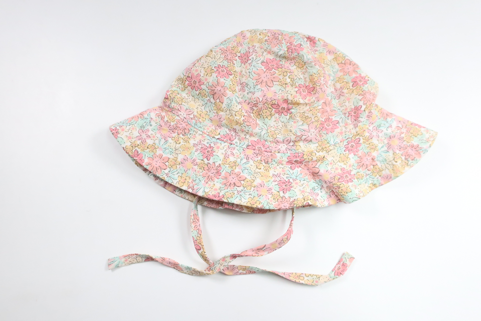 Blommig solhatt från H&M - Storlek 74/80 - Rosa