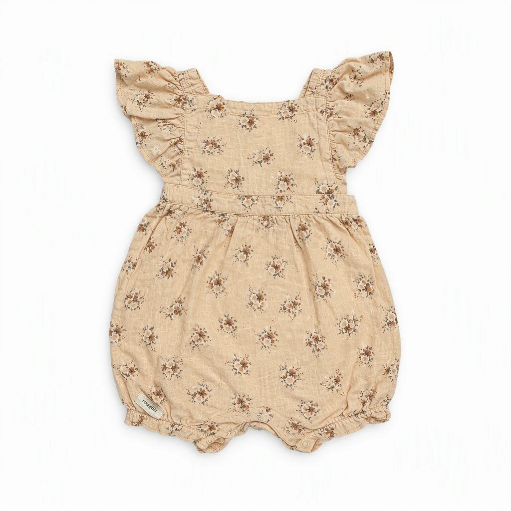 Blommig jumpsuit från Newbie - Storlek 86 - Beige